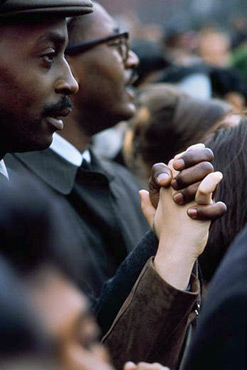 Black and white hands joined in Civil Rights Protest